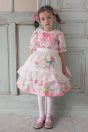 11-006フルーツラベルプリントワンピース <br>（★ピンク/ミント）￥32,780～(100～140cm) <br>11-005キャンディエプロン <br>（★オフ白）￥16,280-(S/Mサイズ) <br>11-020リボンポニー <br>(★ピンク/キイロ/サックス/コン)￥6,380-(Fサイズ) <br>11-022フルーツラベルハイソックス <br>（★ピンク/ミント）￥3,520(14～23㎝) <br>11-009グリッターシューズ <br>(オフ白/★ピンク/アカ)￥12,980～(17～24cm)