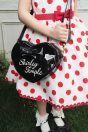 11-324ねこアップリケドットサンドレス <br>(クロ/★アカ) <br>・TODDLER￥28,380～(100～140cm) <br>・SISTER ￥32,780-(150/160cm) <br>11-333ハートエナメルポシェット <br>（アカ/★クロ）￥18,480-(Fサイズ) <br>11-062レースソックス <br>(★オフ白/クロ)￥3,080-(17～23cm) <br>11-024リボンストラップシューズ <br>(ゴールド/★クロ)￥14,080～(15～24㎝)