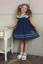 11-422セーラーカットソーワンピース <br>(★コン) <br>・TODDLER ¥23,980～(100～140cm) <br>・SISTER ¥28,380-(150/160cm) <br>11-026リボンクリップ <br>(ピンク/★サックス/アカ)￥3,850-(Fサイズ) <br>＊リボンクリップは1点の価格となります。 <br>11-340リボンフリルサンダル <br>(★オフ白/ピンク/アカ) <br>・BABY￥9,680-(14cm) <br>・TODDLER￥10,230～(15～21cm)