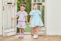 【左】 <br>11-304 サッカーギンガムセーラーブラウス <br>(クロ/★パープル) <br>・BABY￥14,080-(90cm) <br>・TODDLER ￥15,180～(100cm～140cm) <br>・SISTER ￥17,380-(150cm/160cm) <br>11-309 サッカーギンガムショートパンツ <br>(クロ/★パープル) <br>・BABY￥11,880-(90cm) <br>・TODDLER ￥12,980～(100cm～140cm) <br>・SISTER ￥15,180-(150cm/160cm) <br>11-325・326・327 ダブルリボンスポーツサンダル <br>(オフ白/クロ/★パープル)￥12,980～(17～24cm) <br><br>【右】 <br>11-317 サッカーギンガムリボンワンピース <br>(キイロ/★サックス)￥15,180～(100cm～140cm) <br>11-325・326・327 ダブルリボンスポーツサンダル <br>(★オフ白/クロ/パープル)￥12,980～(17～24cm)