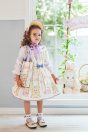 11-666 フラワーパークプリントエプロン風ジャンパースカート <br>(★アイボリー/ピンク) <br>・TODDLER ￥36,080～(100cm～140cm) <br>・SISTER ￥40,480-(150cm/160cm) <br>11-653 リボンフリル襟プルオーバー <br>(オフ白/★パープル) <br>・TODDLER ￥19,580～(100cm～140cm) <br>・SISTER ￥21,780-(150cm/160cm) <br>11-671 フラワーボンネット <br>(ピンク/★パープル)￥29,480-(Fサイズ) <br>11-673 フラワーパークプリントバッグ <br>(★アイボリー/ピンク)￥14,080-(Fサイズ) <br>11-674 はしごリボンフリルソックス <br>(アイボリー/★パープル)￥3,520-(14～23cm) <br>11-013・014・015 グリッターシューズ <br>(★オフ白/ピンク/アカ)￥12,980～(17～24cm)
