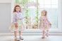 【左】 <br>11-666 フラワーパークプリントエプロン風ジャンパースカート <br>(★アイボリー/ピンク) <br>・TODDLER ￥36,080～(100cm～140cm) <br>・SISTER ￥40,480-(150cm/160cm) <br>11-653 リボンフリル襟プルオーバー <br>(オフ白/★パープル) <br>・TODDLER ￥19,580～(100cm～140cm) <br>・SISTER ￥21,780-(150cm/160cm) <br>11-652 リボン柄カーディガン <br>(ピンク/★パープル) <br>・TODDLER ￥22,880～(100cm～140cm) <br>・SISTER ￥27,780-(Fサイズ) <br>11-671 フラワーボンネット <br>(ピンク/★パープル)￥29,480-(Fサイズ) <br>11-674 はしごリボンフリルソックス <br>(アイボリー/★パープル)￥3,520-(14～23cm) <br>11-013・014・015 グリッターシューズ <br>(★オフ白/ピンク/アカ)￥12,980～(17～24cm) <br><br>【右】 <br>10-664 フラワーパークプリントワンピース <br>(アイボリー/★ピンク) <br>・BABY￥33,880-(80cm/90cm) <br>・TODDLER￥36,080～(100～140cm) <br>10-657 フラワー刺繍プルオーバー <br>(★オフ白) <br>・BABY￥14,080-(80cm/90cm) <br>・TODDLER￥15,180～(100～140cm) <br>11-670 シマエナガクリップ <br>(オフ白/★ピンク)￥5,280-(Fサイズ) <br>11-035 グログランリボンつきクルーソックス <br>(★オフ白)￥3,520-(11～23cm) <br>10-523・524 布リボンストラップシューズ <br>(★ピンク/アカ/クロ)￥11,880～(14～21cm) <br>※19～21cmはアカ/クロ 2色のご用意です。